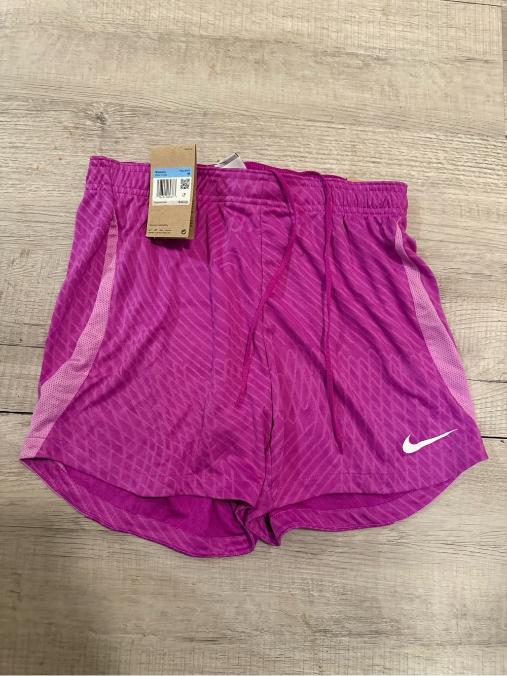 Nike Women’s Purple Running Shorts size M NWT.
